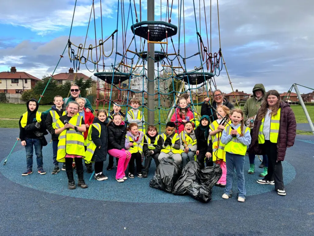 Group of children litter picking