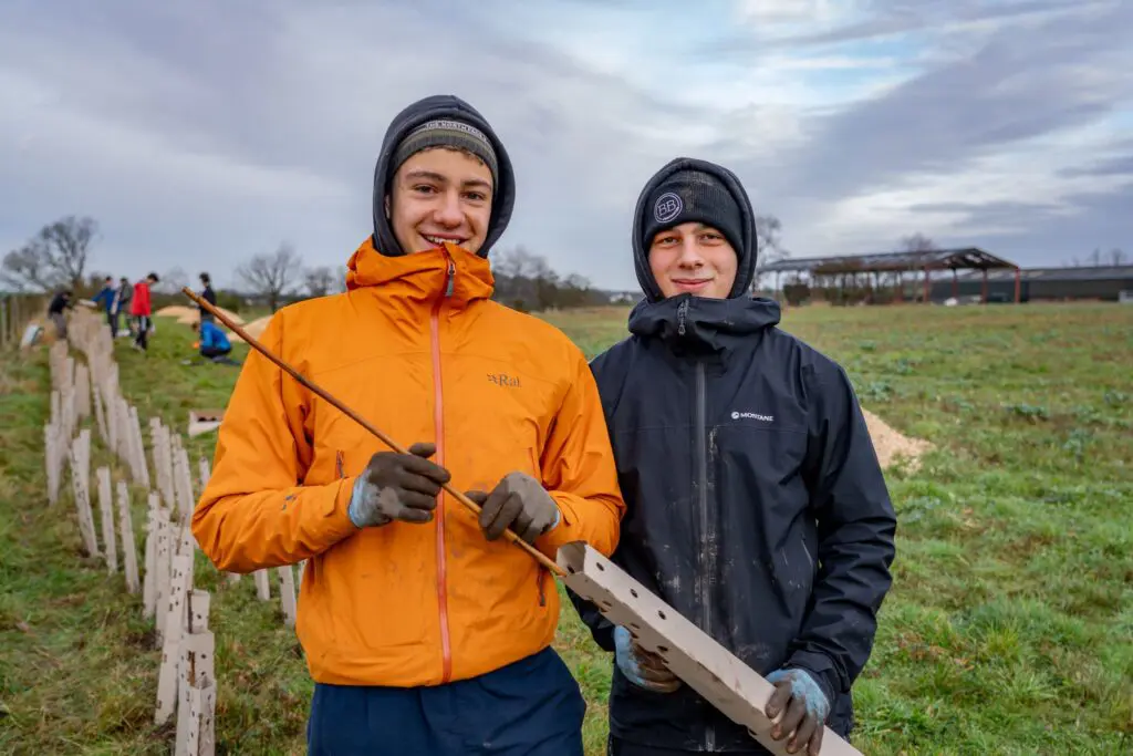 Smiling Hedges and Edges volunteers hedgeplanting at Eden Yard farm