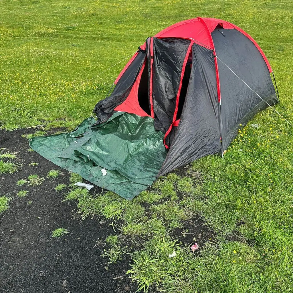An abandoned tent on a hill