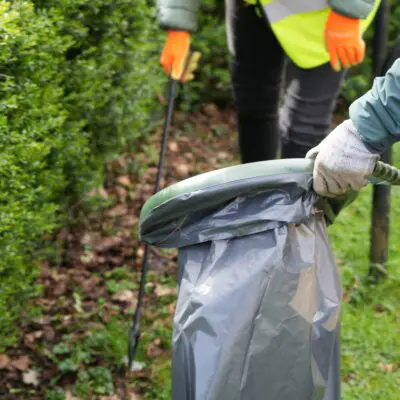 Close up someone litter picking