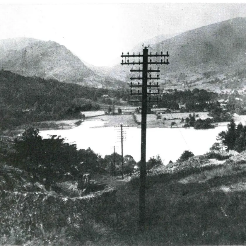 An old photo of overhead telephone lines running towards Grasmere