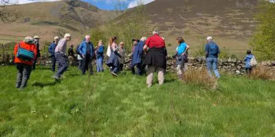 People exploring Dam Mire