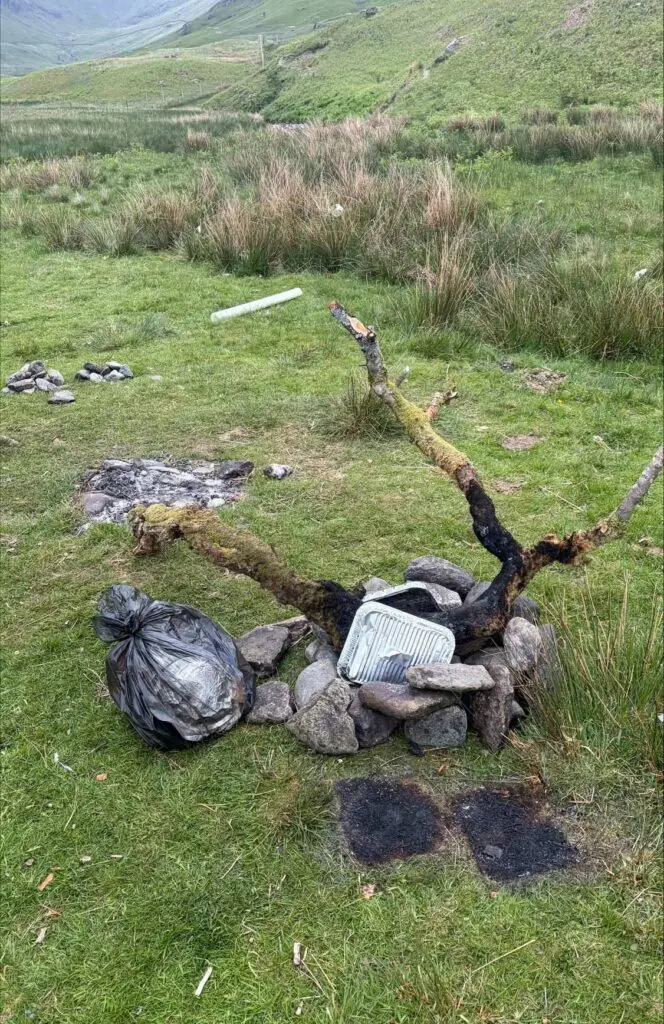 Burnt wood and disposable BBQ rubbish at Buckstone's Jump May 2026