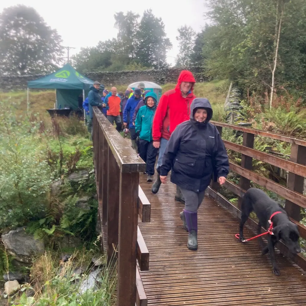 People on the new footbridge at Dam Mire Wood