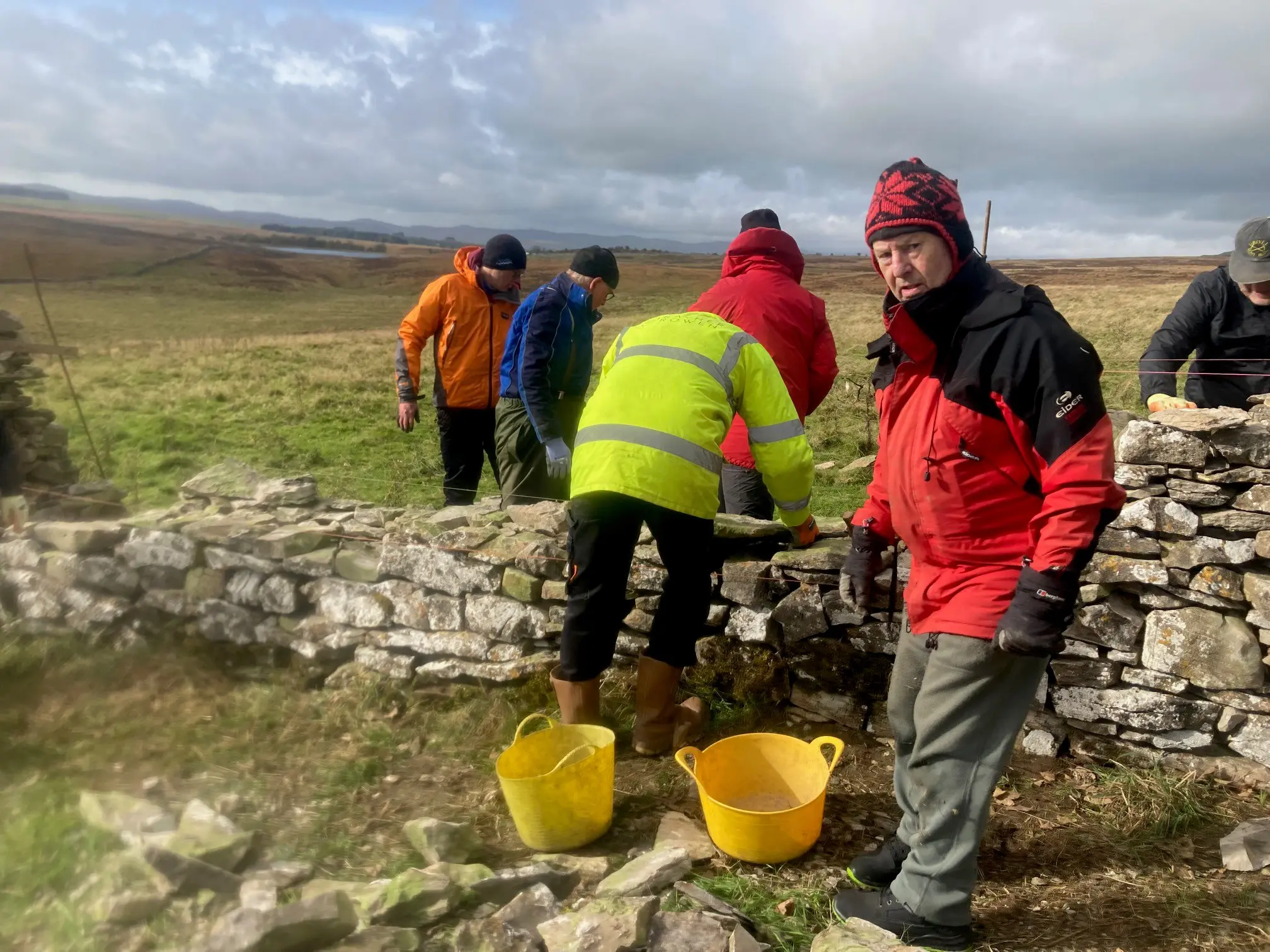 People dry stone walling