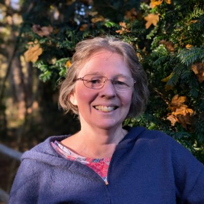 A woman smiling