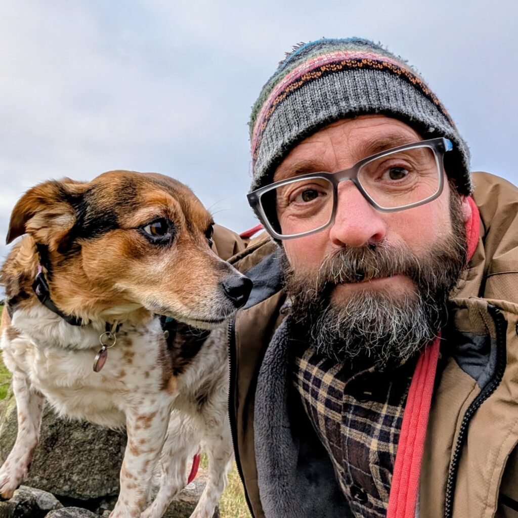 Photo of man and his dog