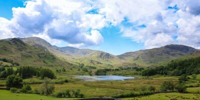 Little Langdale Tarn under a blue sky