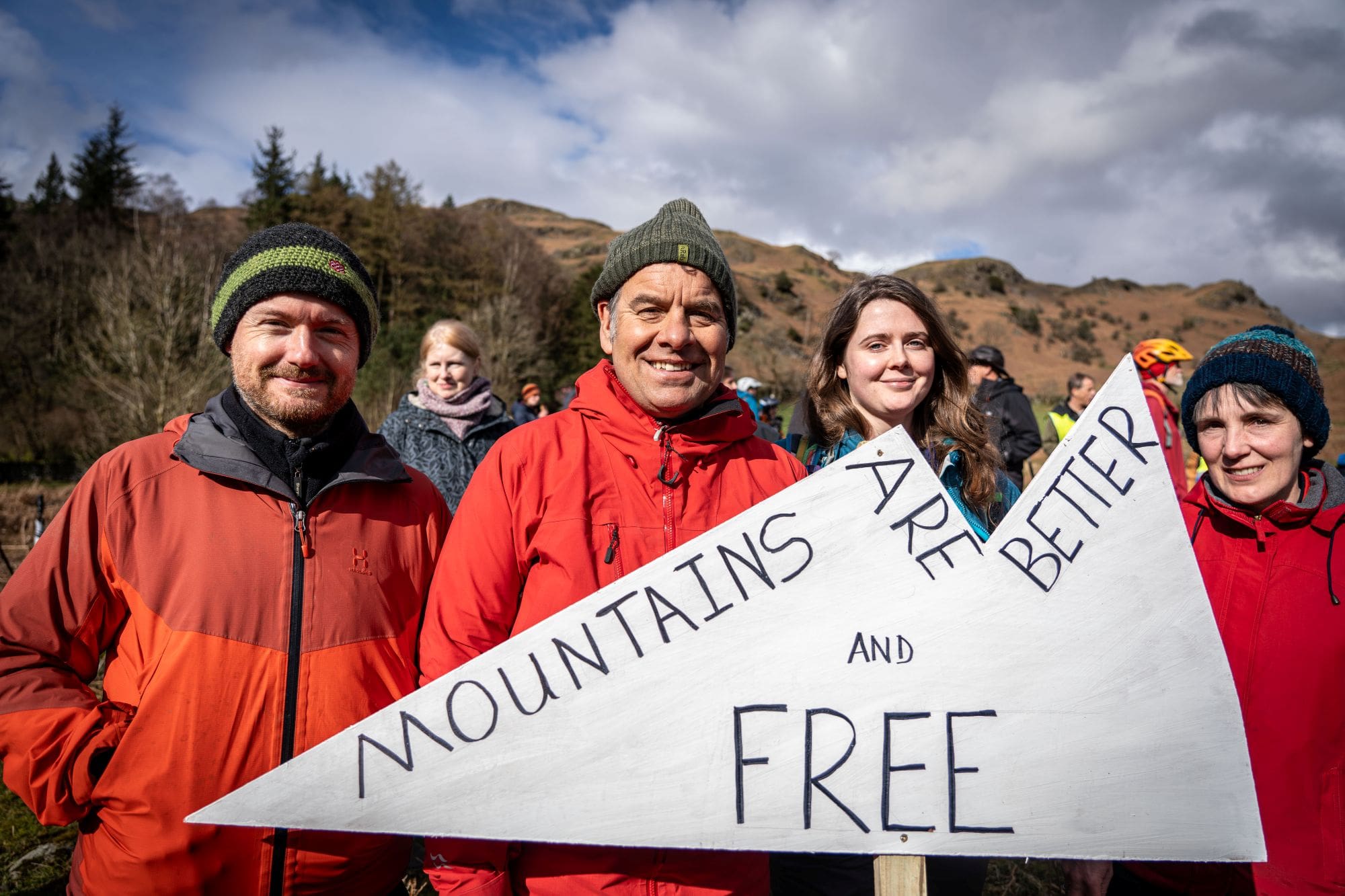 Protesters at Elterwater common hold a sign saying Mountains are better free, credit Jonny Gios banner