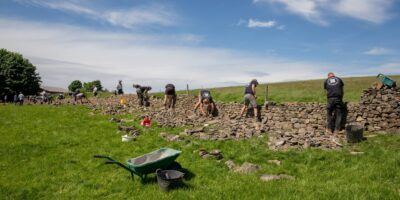Dry Stone Walling Competition wallers at work